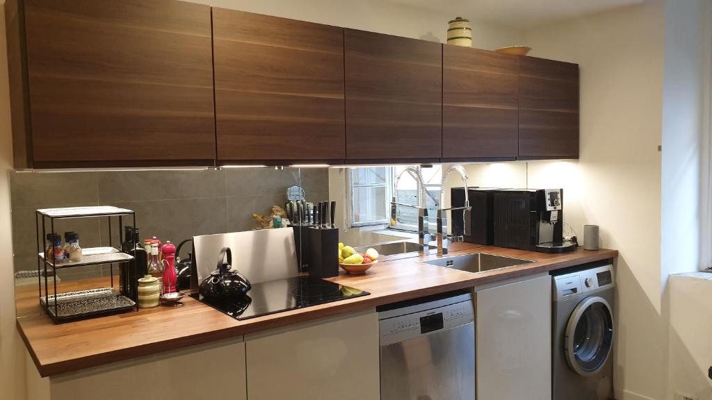 A kitchen or kitchenette at The SPIRIT OF LUCCA with all comfortable amenities
