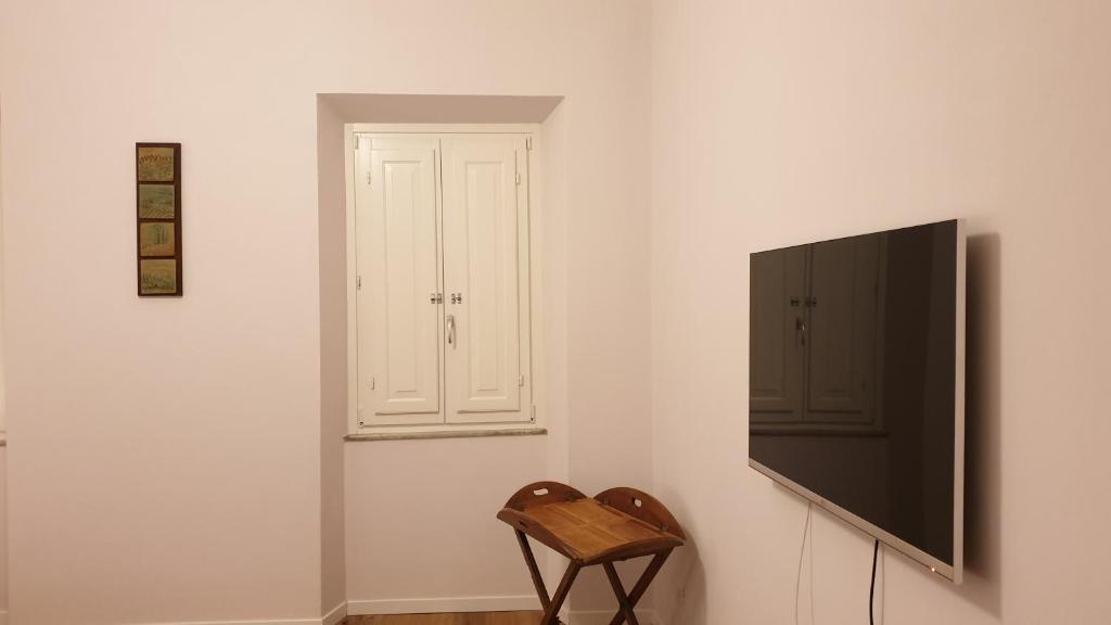 A television and/or entertainment centre at The SPIRIT OF LUCCA with all comfortable amenities