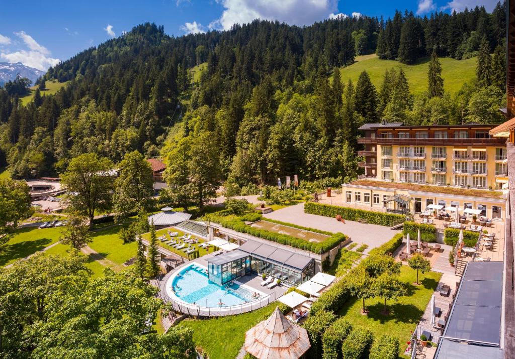 an aerial view of a hotel with a resort at Lenkerhof gourmet spa resort - Relais & Châteaux in Lenk