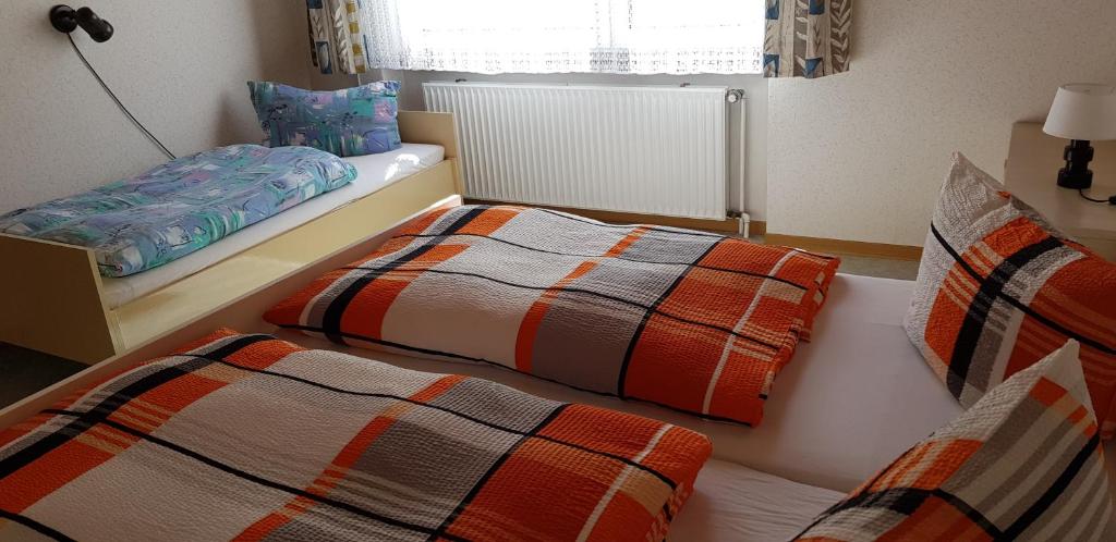 Postel nebo postele na pokoji v ubytování Hotel Zur Schanze
