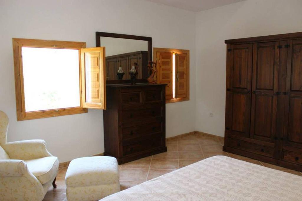 Posteľ alebo postele v izbe v ubytovaní La Cabieda - Junto al Río Cañamares - ideal para grupos y familias