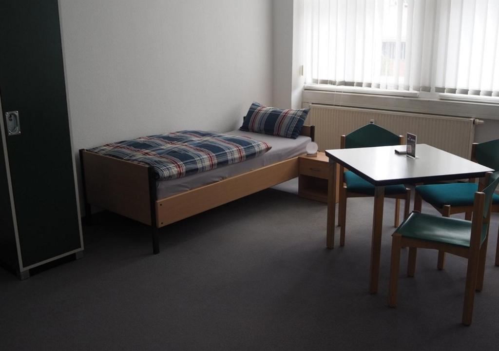 Postel nebo postele na pokoji v ubytování Hostel jo-si