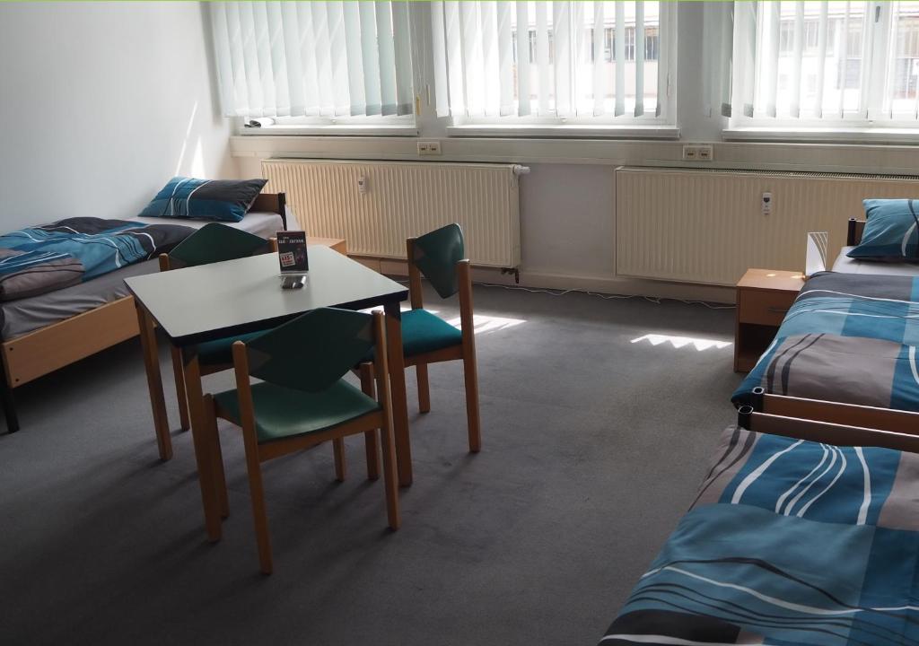 Postel nebo postele na pokoji v ubytování Hostel jo-si