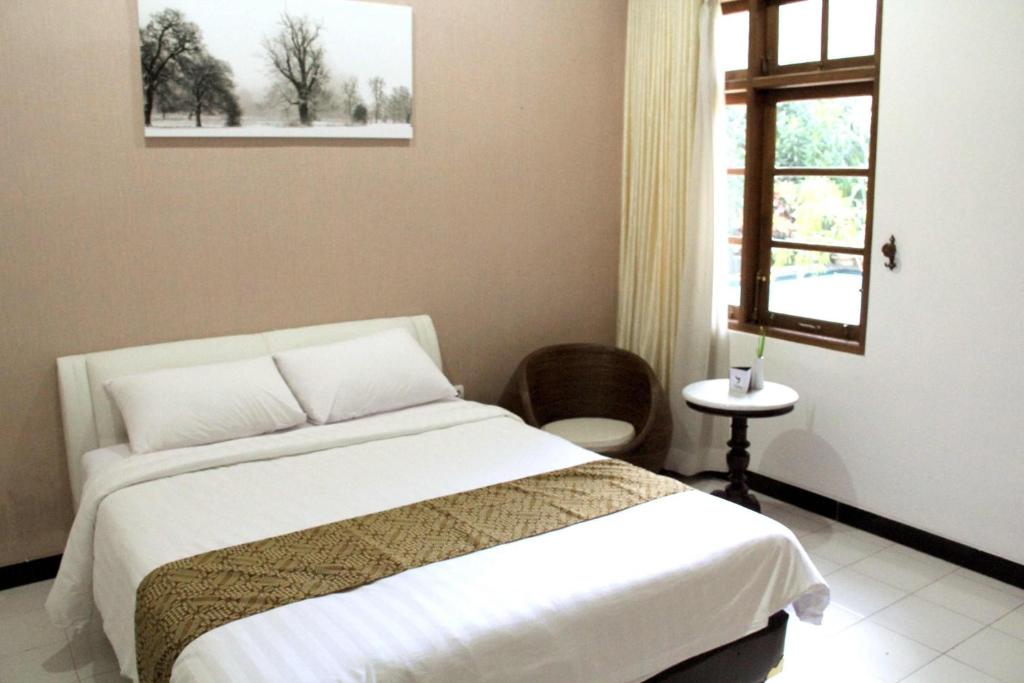 Letto o letti in una camera di Griya Yunika