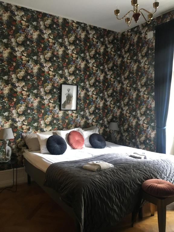 Postel nebo postele na pokoji v ubytování Morris Hotel