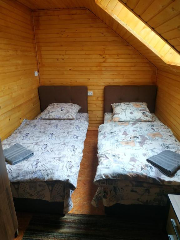 Postel nebo postele na pokoji v ubytování У Оксани