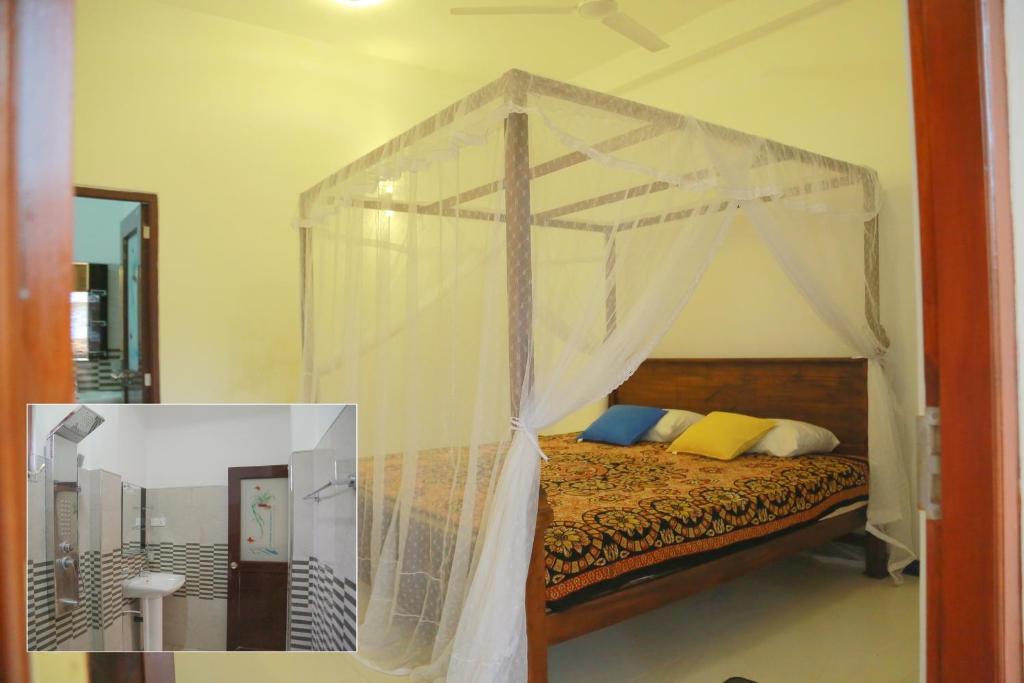 Postel nebo postele na pokoji v ubytování Gihan Guesthouse