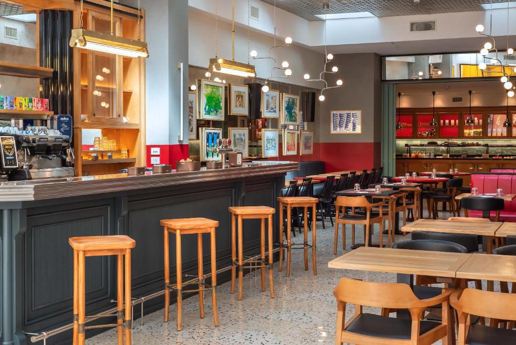 A área de bar ou lounge em Albergo Etico Roma