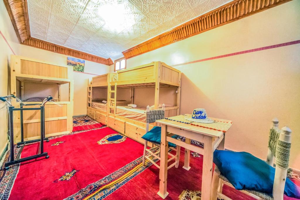 Postel nebo postele na pokoji v ubytování Dar Widad