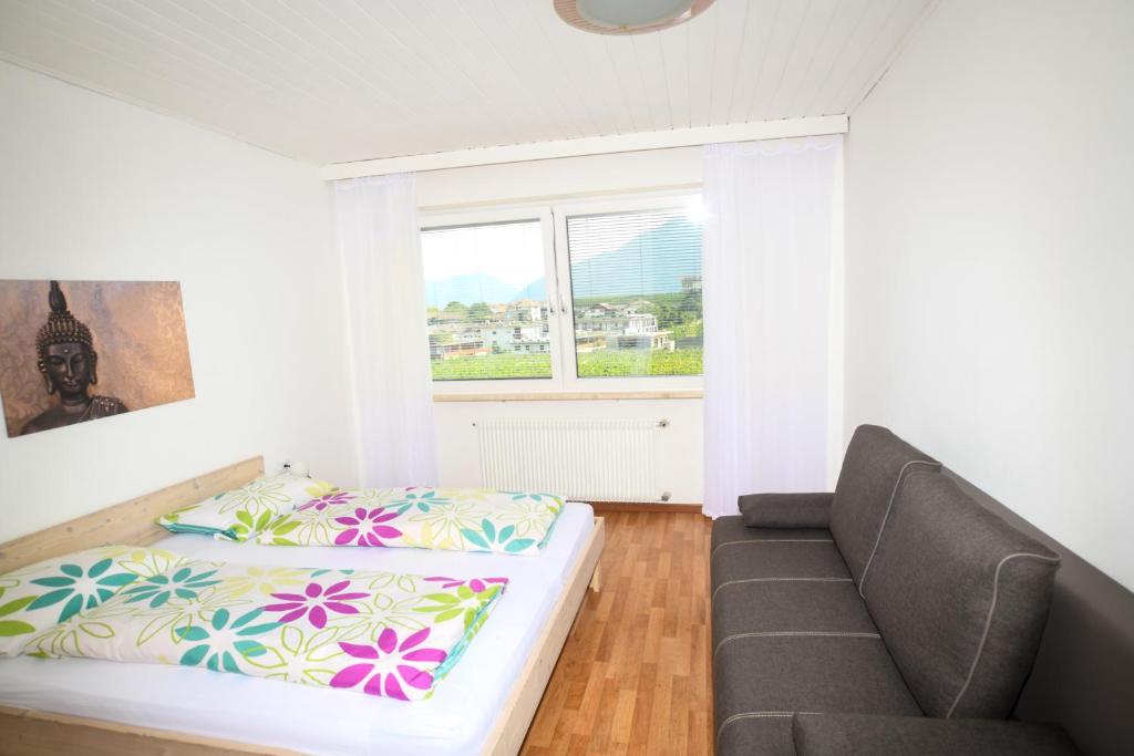 Postel nebo postele na pokoji v ubytování Haus Matha