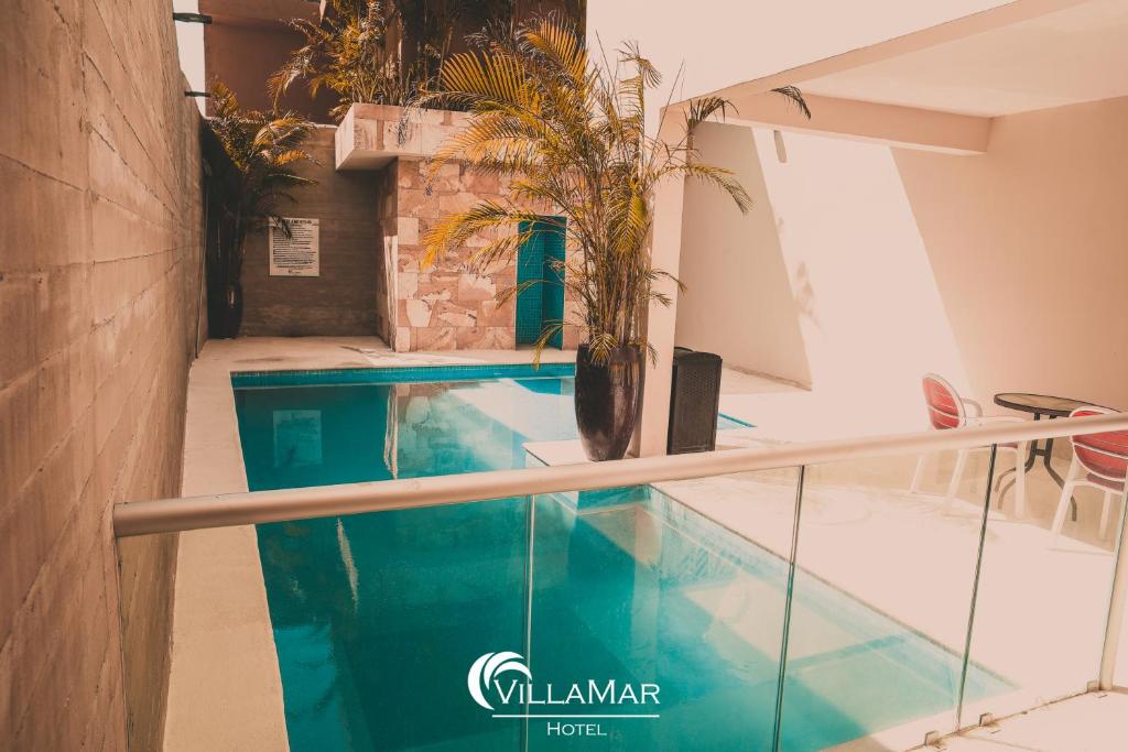 Bazén v ubytování Hotel Villamar nebo v jeho okolí