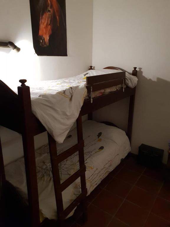 Postel nebo postele na pokoji v ubytování Appartamento Rialto Terminillo