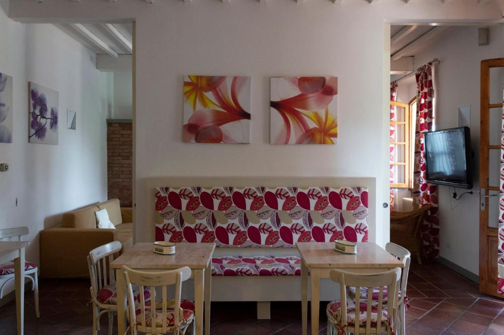 Posezení v ubytování Hotel Le Renaie