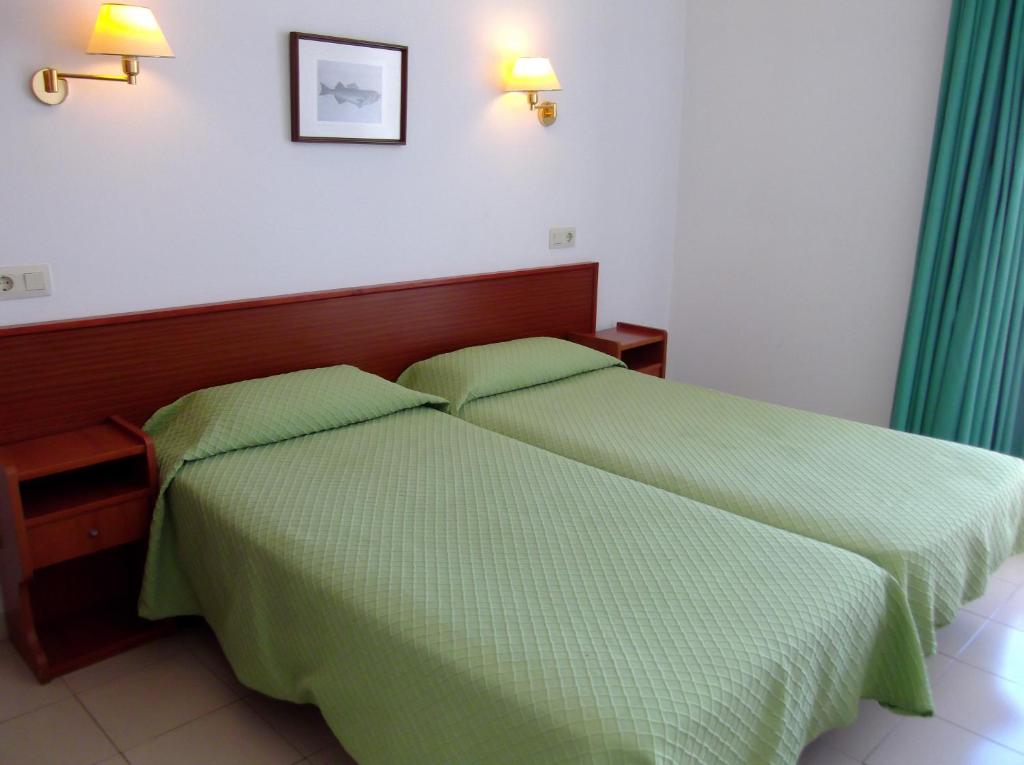 Postel nebo postele na pokoji v ubytování Hotel Simeon
