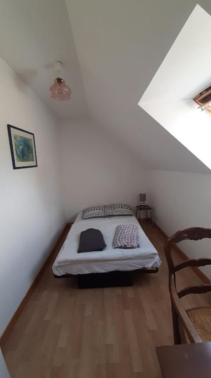 Postel nebo postele na pokoji v ubytování Gîte Cocantin
