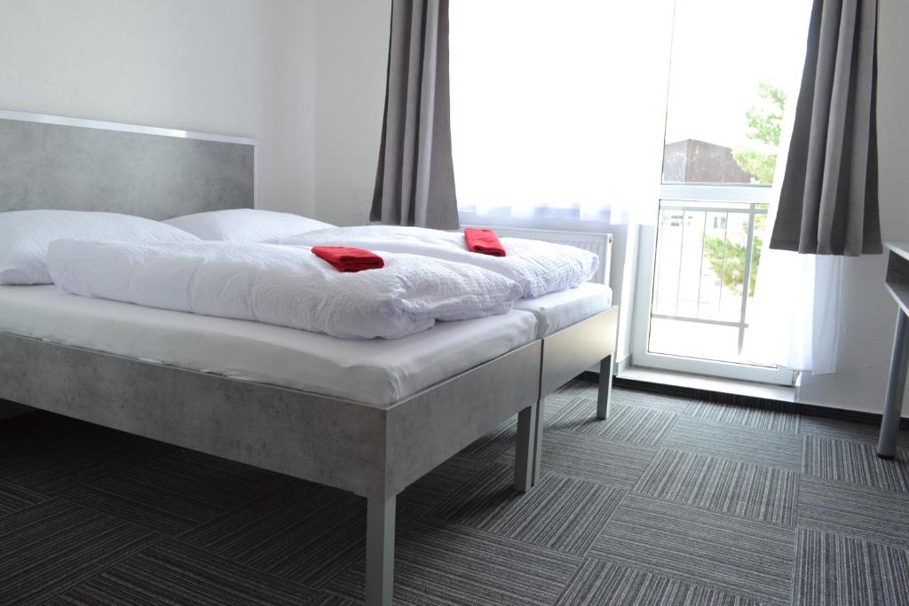 Posteľ alebo postele v izbe v ubytovaní Garni Hotel 31