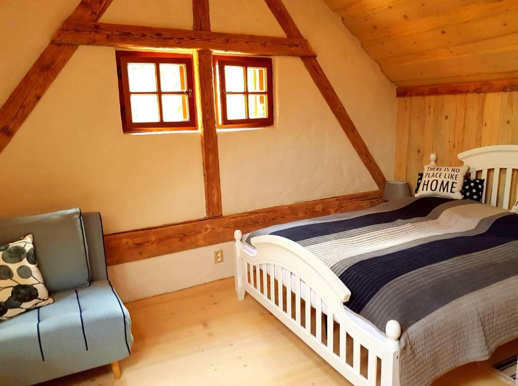 Postel nebo postele na pokoji v ubytování Ubytování u Šrámečků
