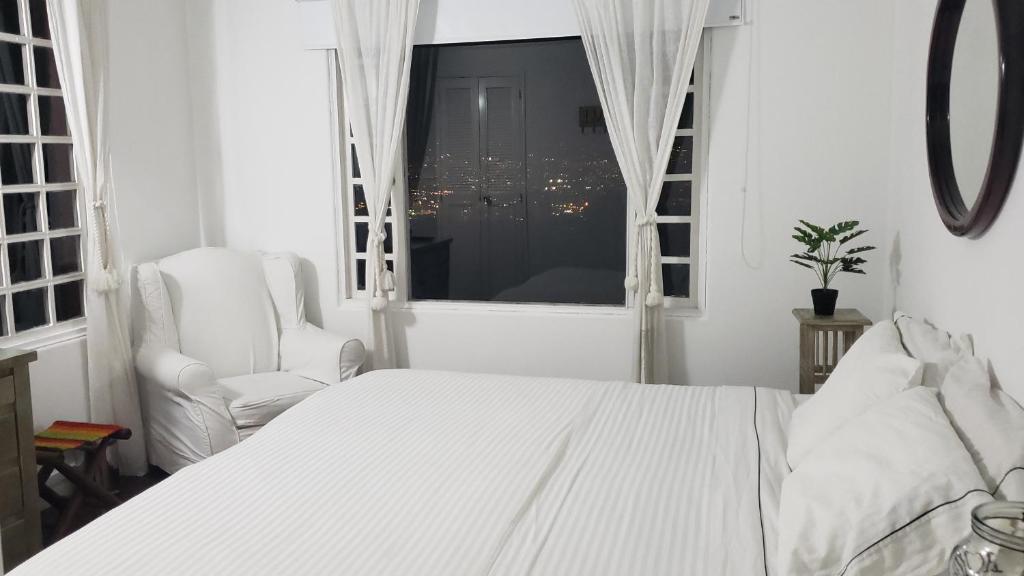 Voodi või voodid majutusasutuse Hotel Casa Madero toas