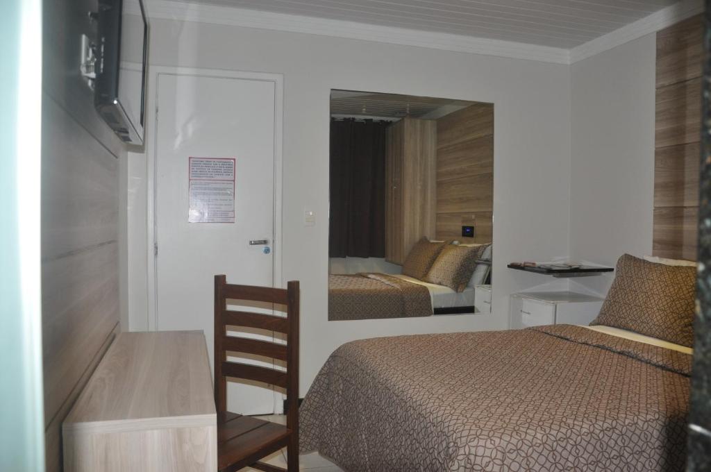 TV a/nebo společenská místnost v ubytování Hotel Sempre Bahia