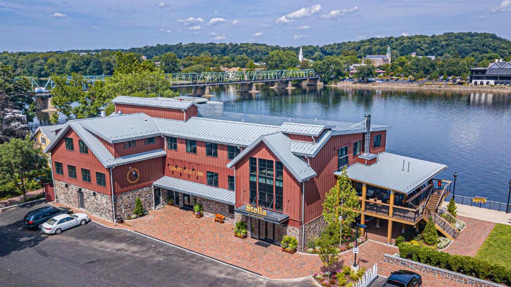 an aerial view of a building on the water at Ghost Light Inn in New Hope