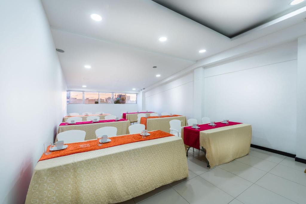 Postel nebo postele na pokoji v ubytování Hotel Bogota Resort