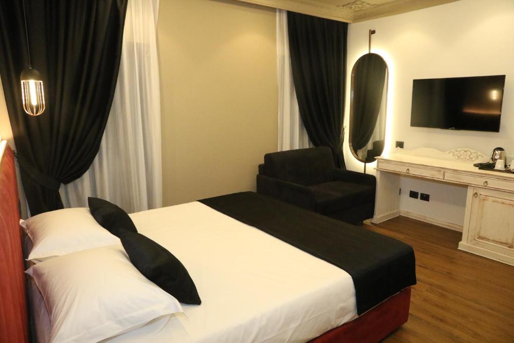 Postel nebo postele na pokoji v ubytování Hotel Kloest