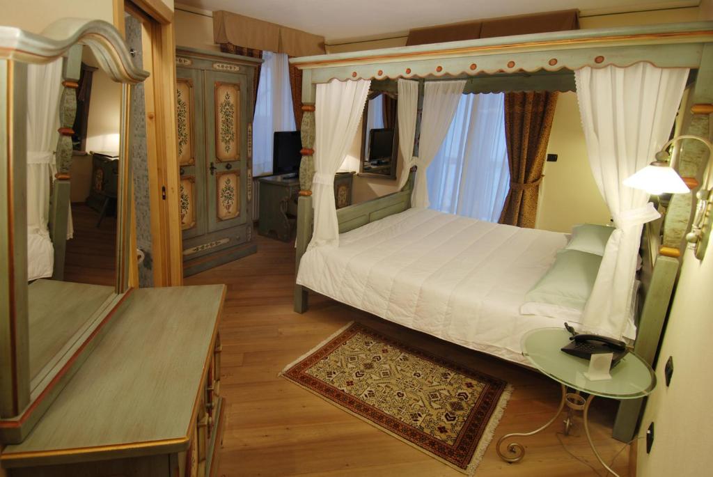Postel nebo postele na pokoji v ubytování Hotel Bes & Spa