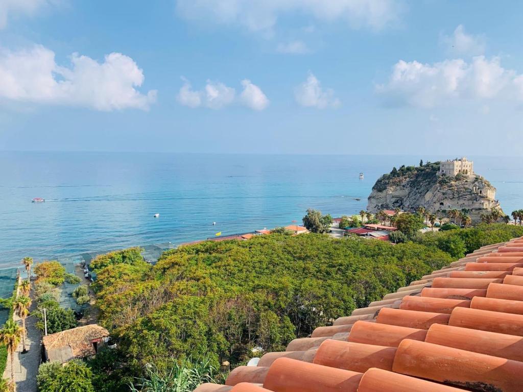 a view of the ocean from the roof of a building at Nereide in Tropea