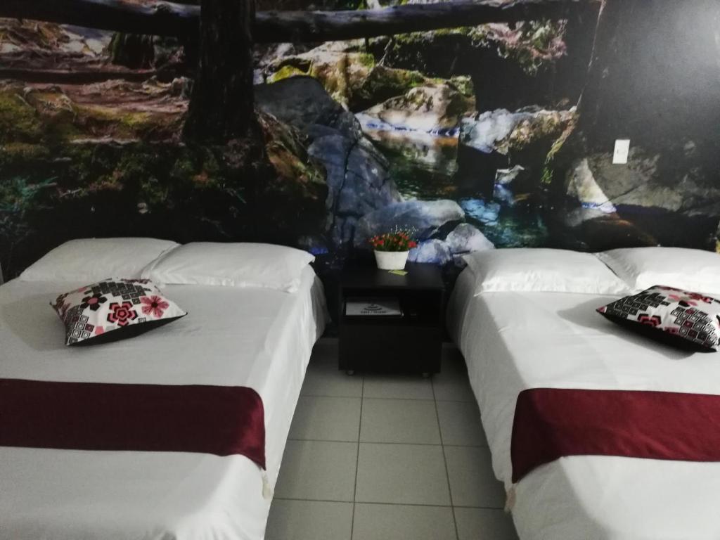 Postel nebo postele na pokoji v ubytování APARTA ESTUDIO 7051