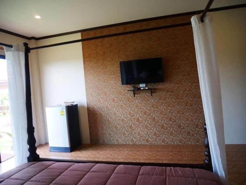 TV a/nebo společenská místnost v ubytování Tinna Resort