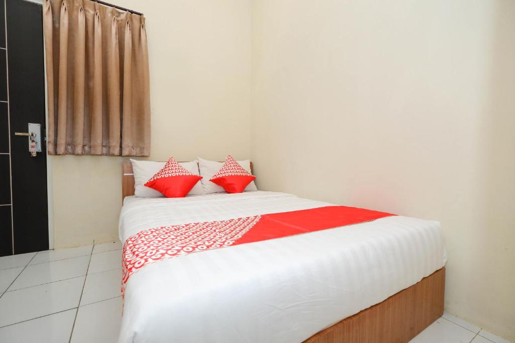 Postel nebo postele na pokoji v ubytování Unta Residence