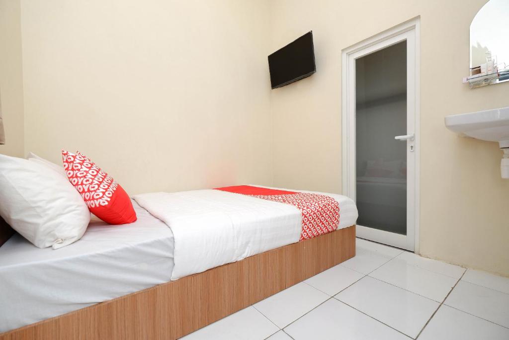 Postel nebo postele na pokoji v ubytování Unta Residence