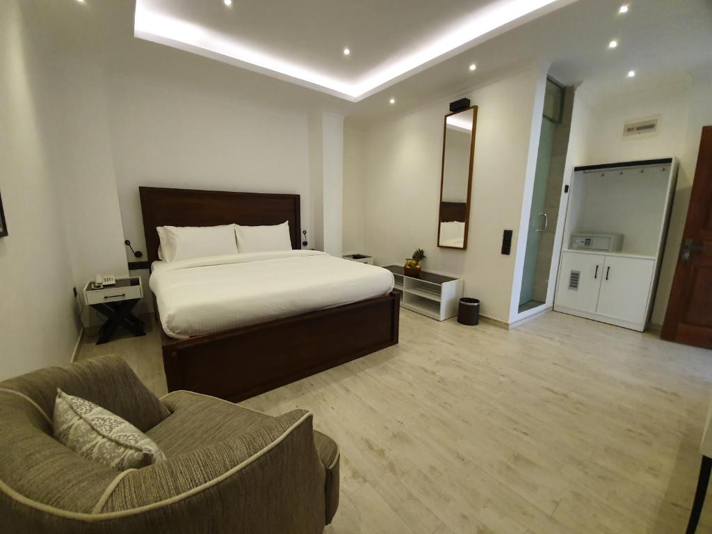 Postel nebo postele na pokoji v ubytování Bed Station 210
