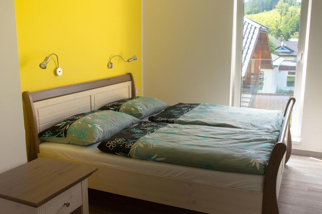 Postel nebo postele na pokoji v ubytování Vila pod Černou horou