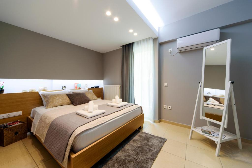 Posteľ alebo postele v izbe v ubytovaní M&D Luxury Suites in central Athens