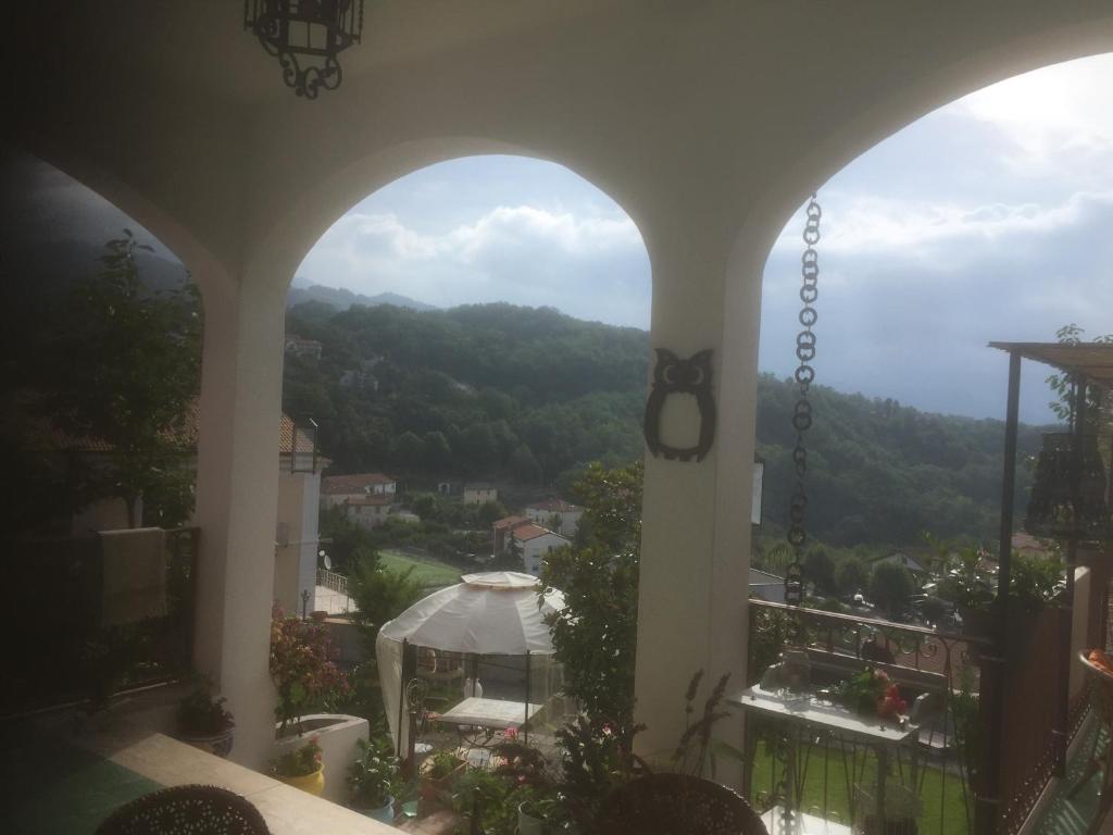 a view of a mountain from a balcony at Villa Alemi' in Rivello