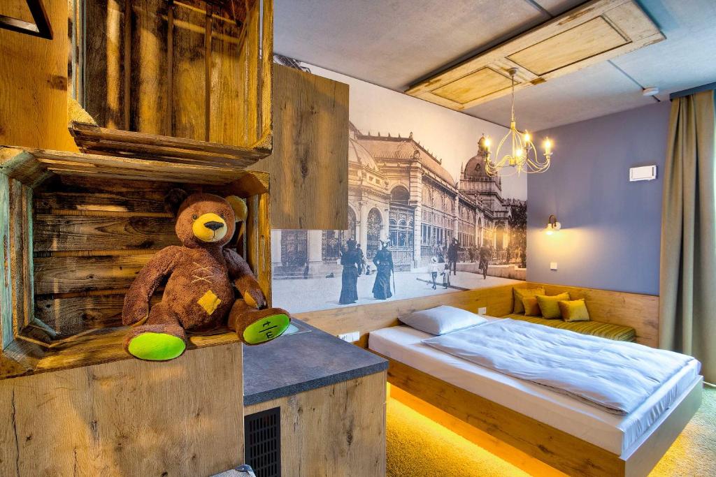 Postel nebo postele na pokoji v ubytování tinyTwice Hotel Wiesbaden