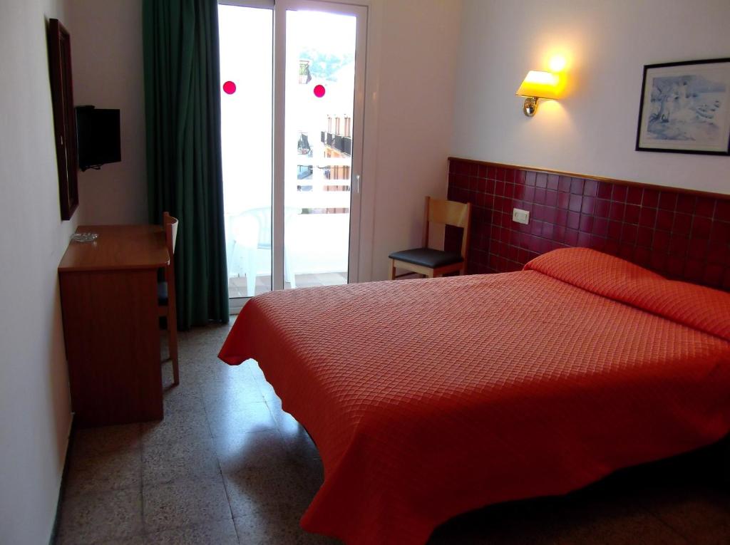 Postel nebo postele na pokoji v ubytování Hotel Simeon