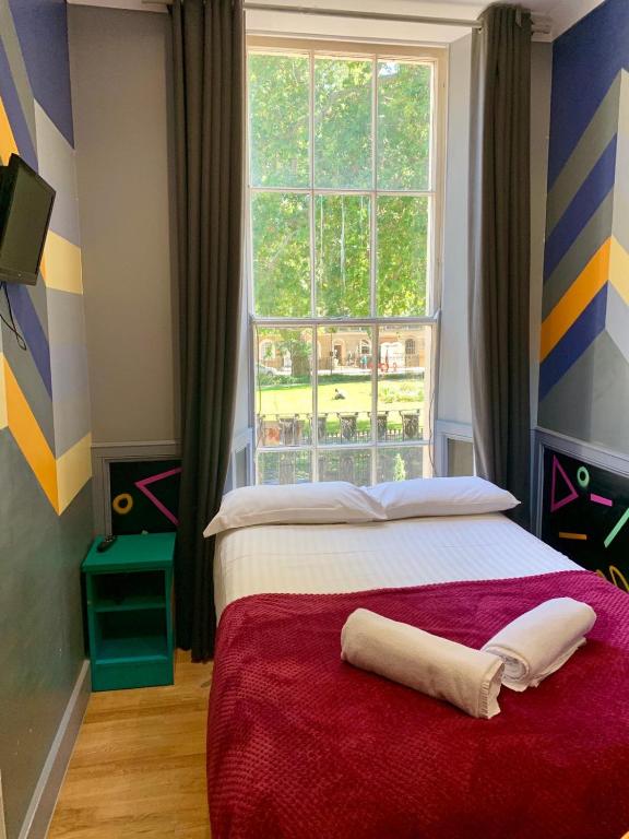 Un ou plusieurs lits dans un hébergement de l'établissement KX Rooms Kings Cross