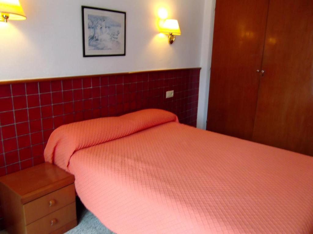 Postel nebo postele na pokoji v ubytování Hotel Simeon