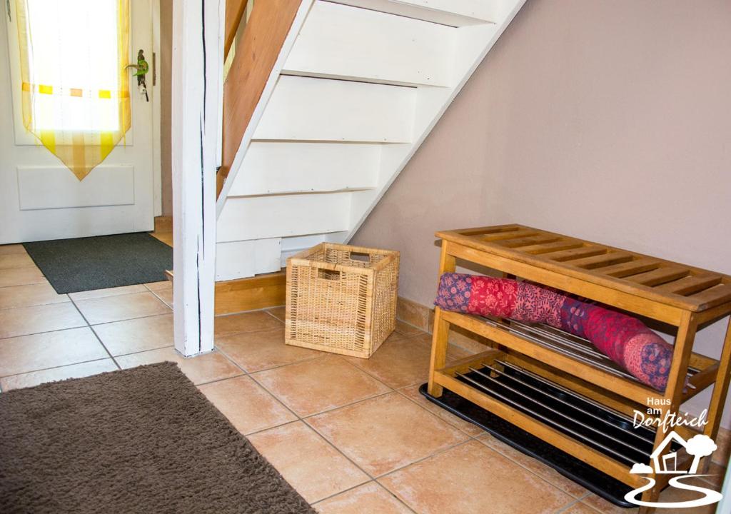 Postel nebo postele na pokoji v ubytování Haus am Dorfteich Fehmarn