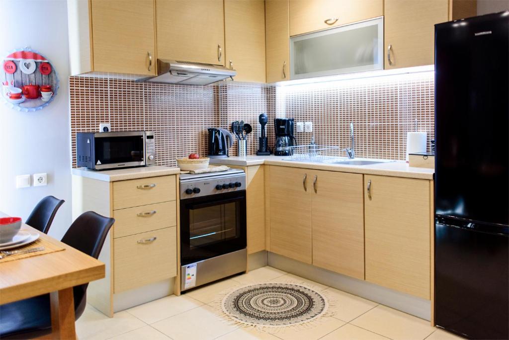 Kuchyňa alebo kuchynka v ubytovaní M&D Luxury Suites in central Athens