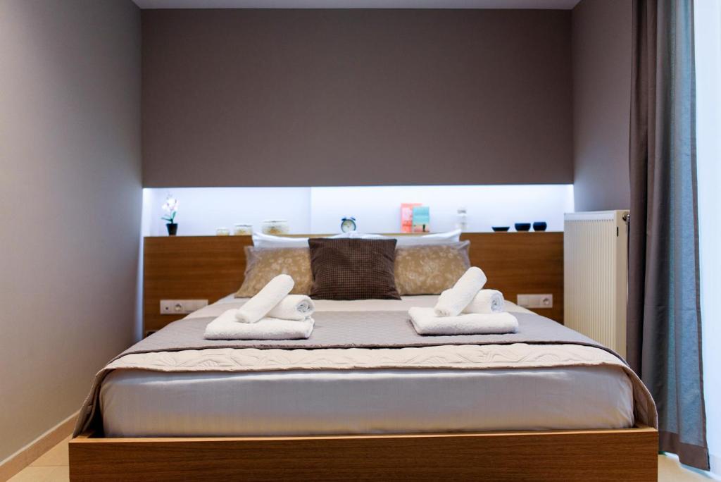 Posteľ alebo postele v izbe v ubytovaní M&D Luxury Suites in central Athens