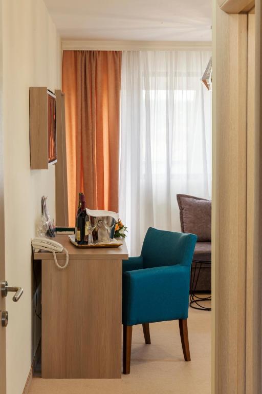 TV a/nebo společenská místnost v ubytování Hotel Livade