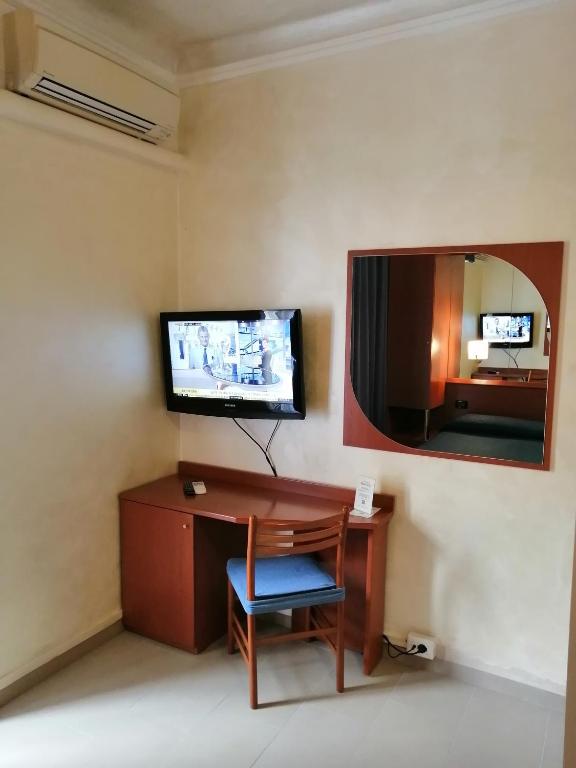 TV a/nebo společenská místnost v ubytování Hotel Aurora