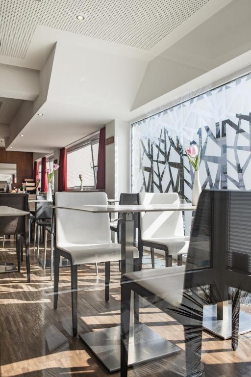 Posezení v ubytování H+ Hotel Ried