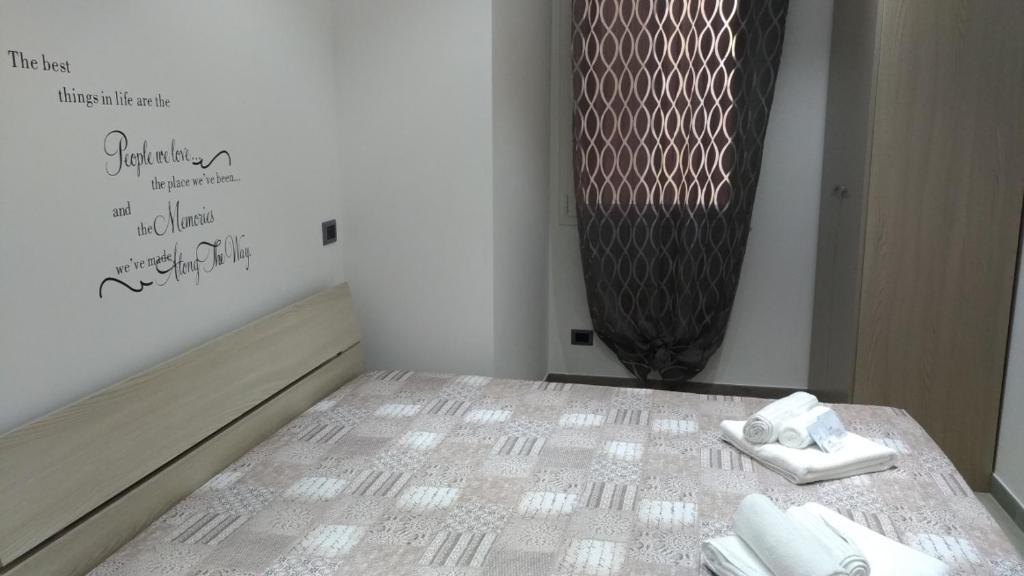 Łóżko lub łóżka w pokoju w obiekcie Sunrise Beach Apartment Trapani