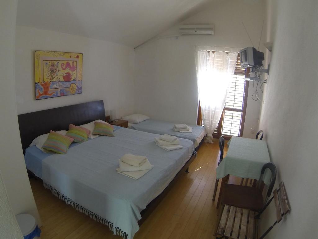 Postel nebo postele na pokoji v ubytování Apartments Almaja Villa