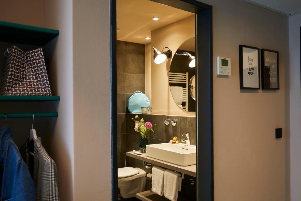 Koupelna v ubytování Hotel Metropol by Maier Privathotels