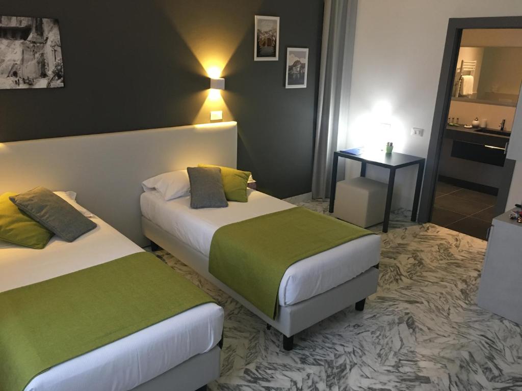 A bed or beds in a room at Mikeme